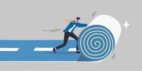 An illustration of a guy in business attire is unrolling a road like a rug