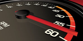 Graphic of a speedometer ticking past 55 mph