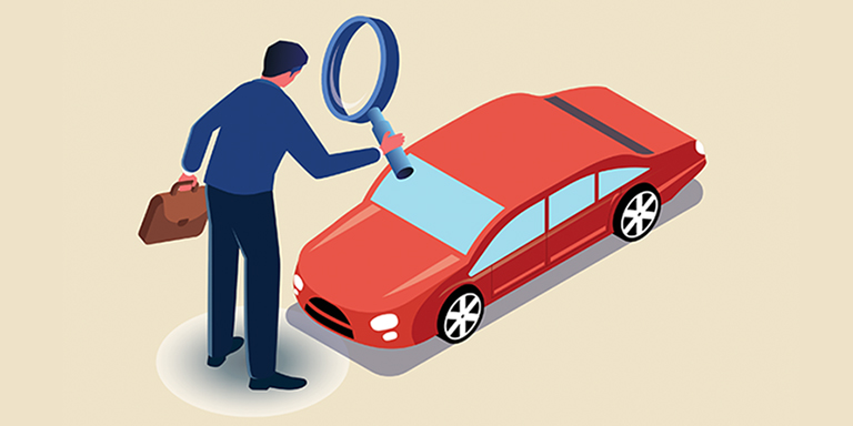 Conceptual image of man looking at a car with a magnifying glass