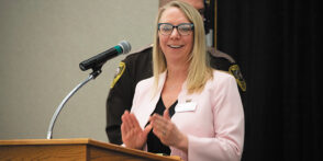 Robin Rehborg speaking at an awards banquet